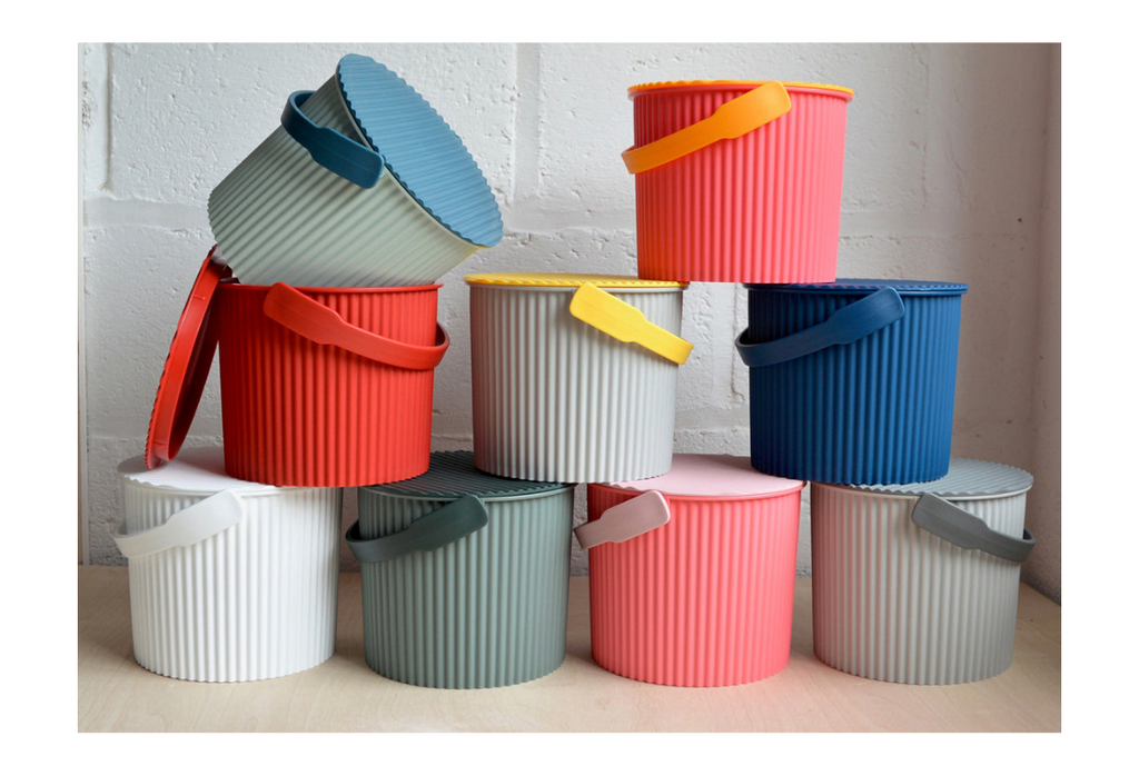 range of colourful storage buckets stacked on top of each other