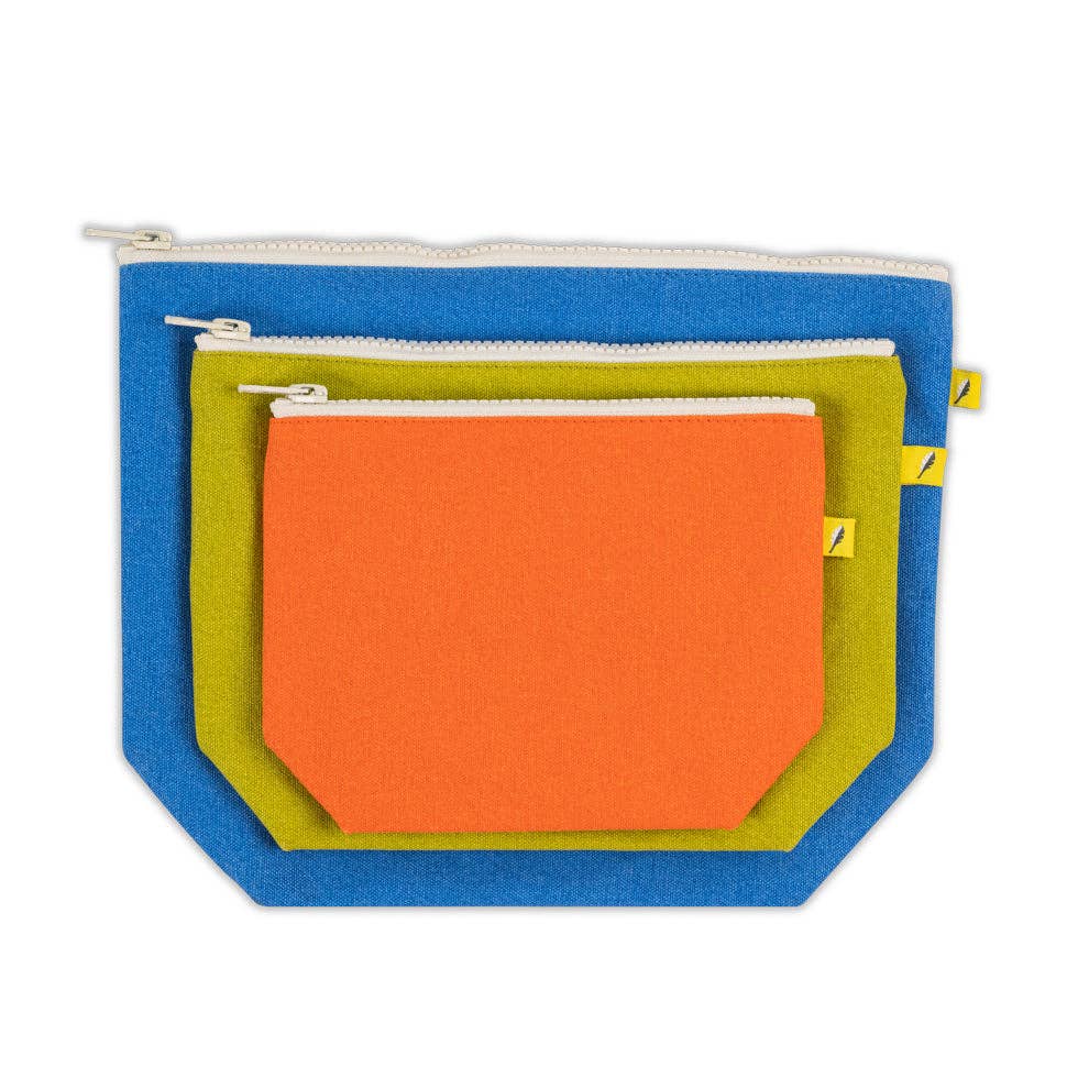 Set of three colorful pouches with zippers on a white background