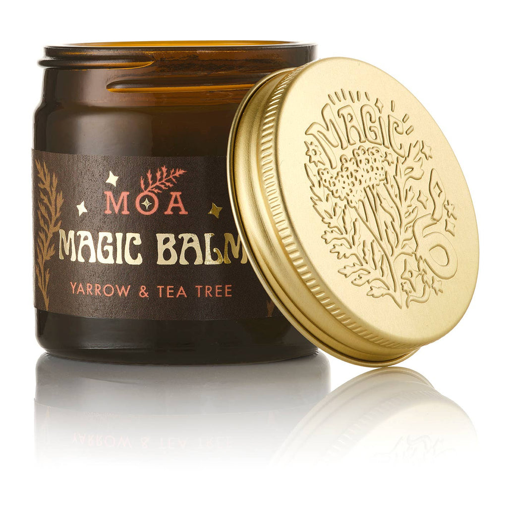 MOA Magic Balm jar with gold lid on a white background