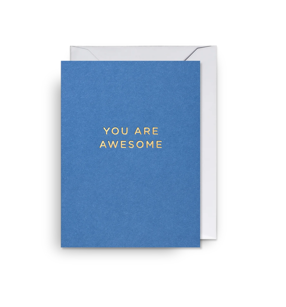 A cobalt blue mini greetings card from Lagom Design with a message in gold foil that reads 'You Are Awesome'