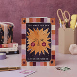 sister paper co. - you make the sun shine brighter card on stationery table - winter's moon