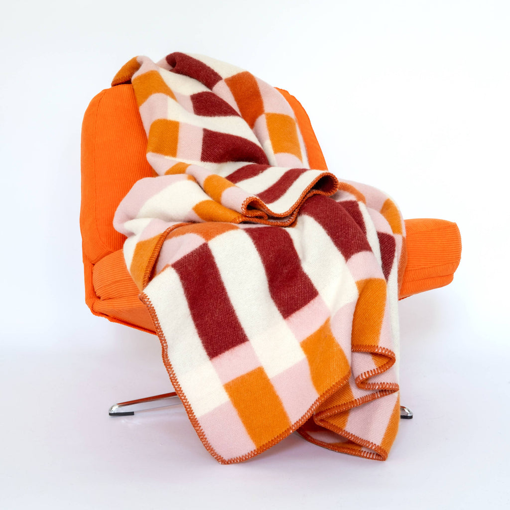 Sophie Home Studie Blanket on orange chair
