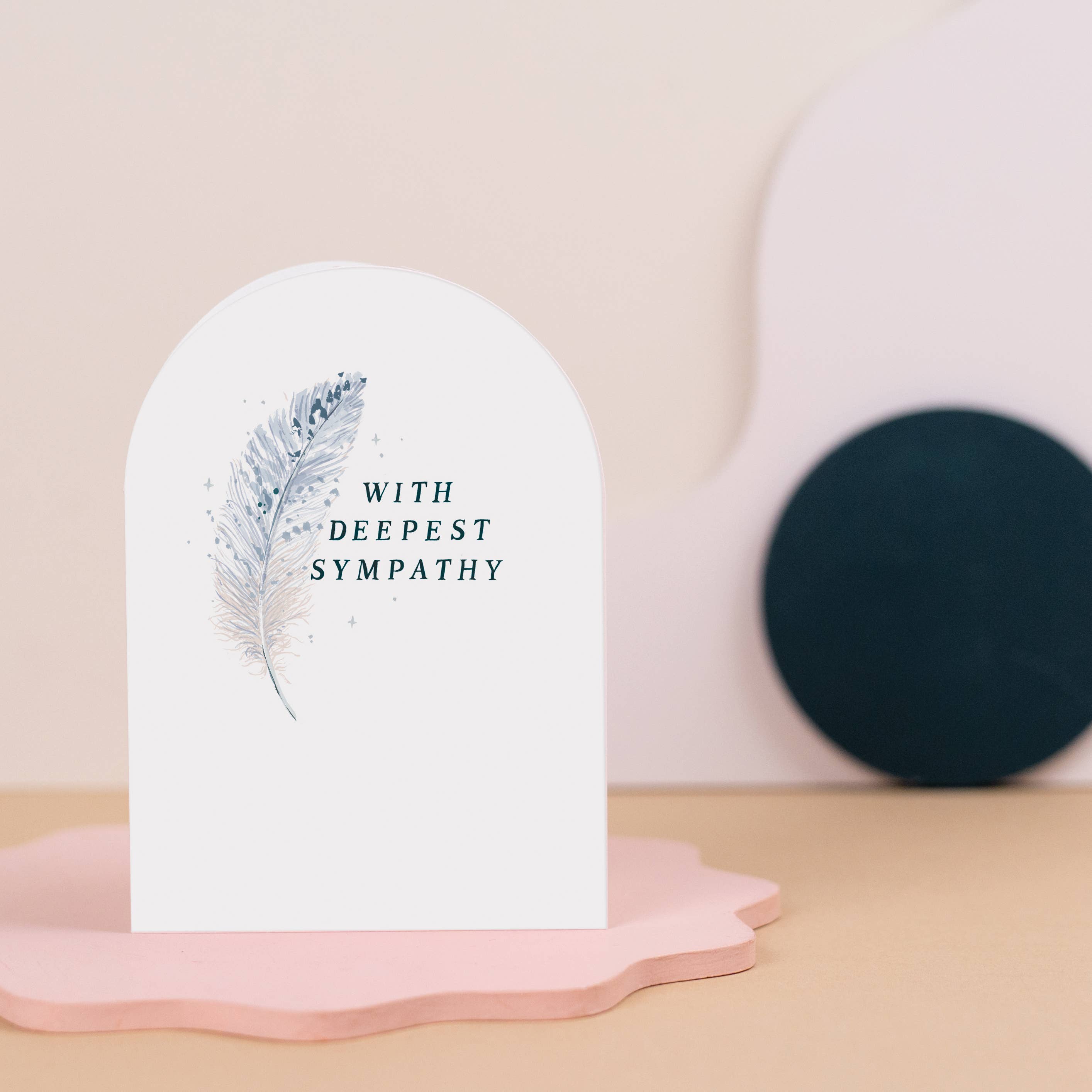 sister paper co - deepest sympathy feather card stood on table - winter's moon