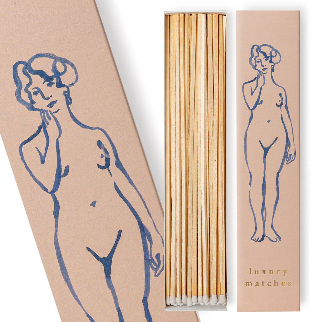 Pink boxed luxury matches by Wanderlust Paper Co with nude painted figure illustration 