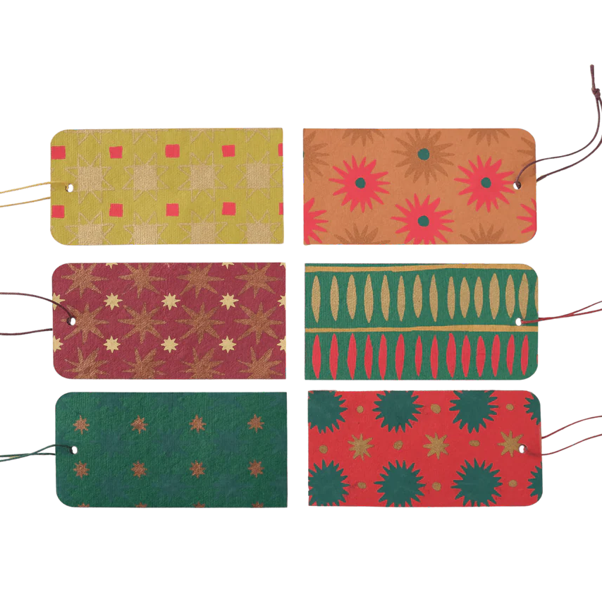Set of six colorful patterned gift tags on a white background
