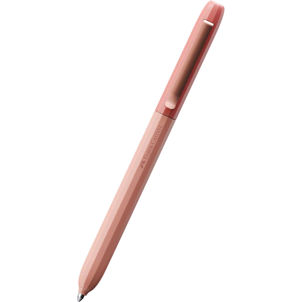 Rose gold pen on a white background