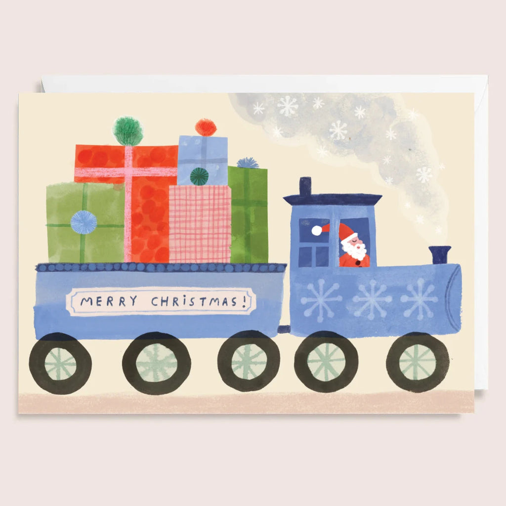 Christmas card with a blue train carrying presents and 'Merry Christmas!' message on a snowy background.