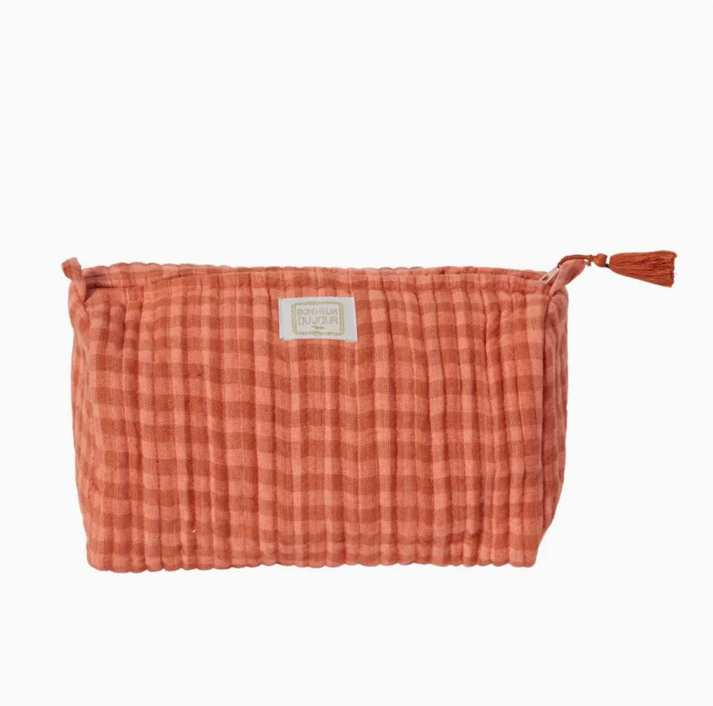 terracotta and pink gingham toiletry pouch, with a tassel zip