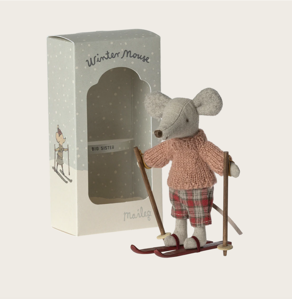 Stuffed mouse toy on skis with a matching box labeled 'Winter Mouse' on a light gray background.