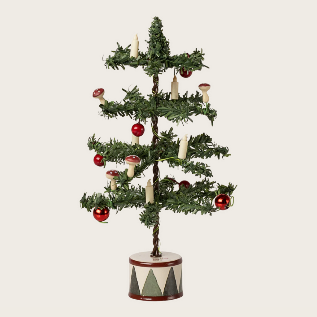 Decorative Christmas tree with ornaments on a white background