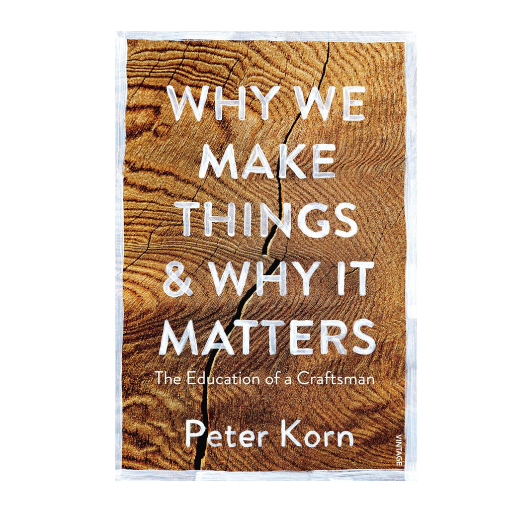Book cover of 'Why We Make Things & Why It Matters' by Peter Korn with a wooden texture background.