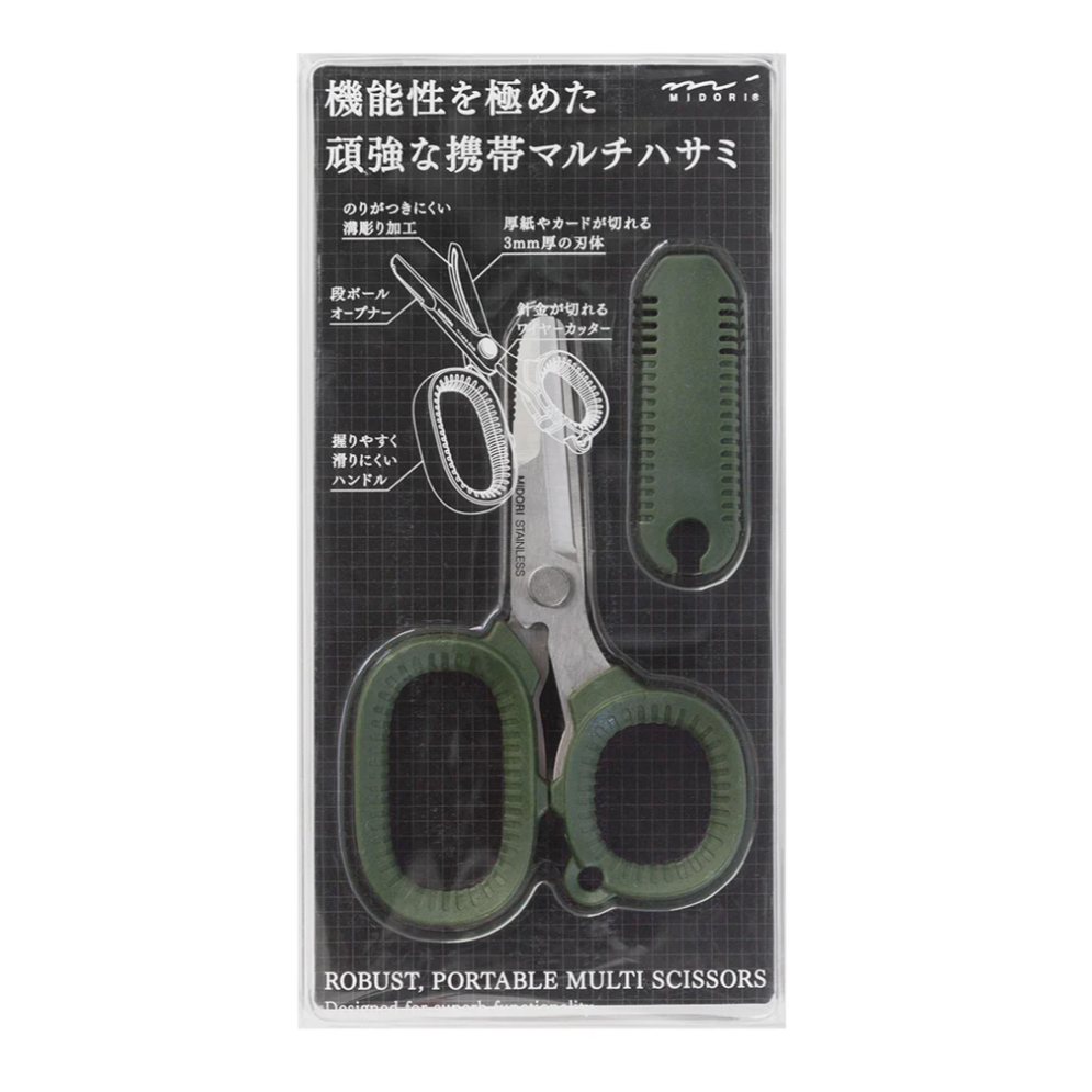 Packaged green scissors with Japanese text on a white background