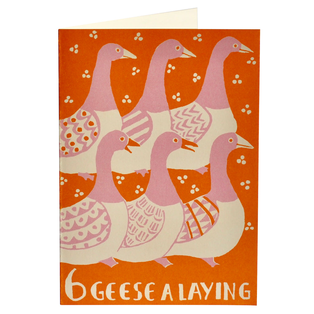 Card with illustration of geese and text '6 geese a laying' on an orange background