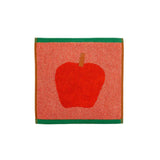 Face cloth with a red apple design on a white background