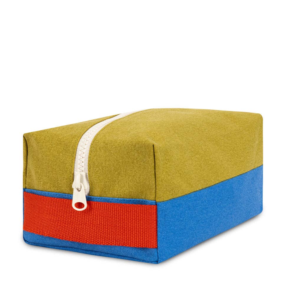 Rectangular fabric box with a zipper in green, red, and blue on a white background