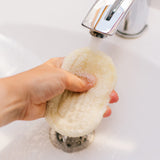 croll & denecke - loofah soap pad being rinsed in sink - winter's moon