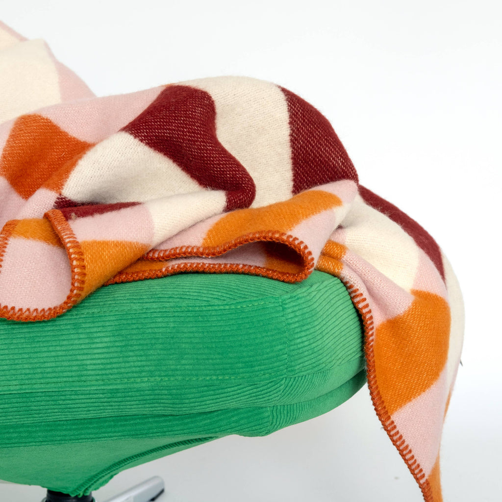 Sophie Home Studie Blanket on green chair