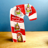 Die cut candy cane shaped card on blue background