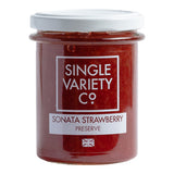 diverse fine food - jar of single variety co sonata strawberry preserve on white background - winter's moon