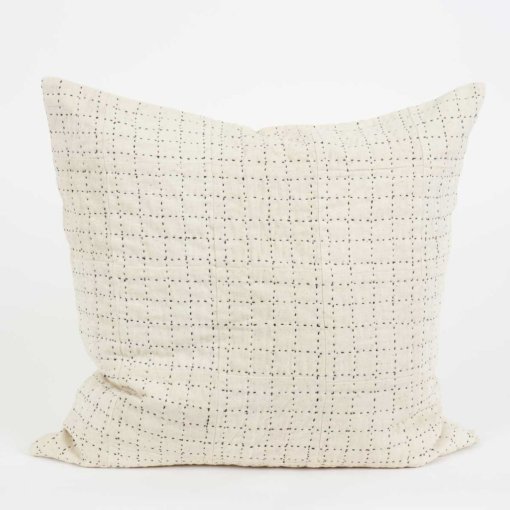 Hand-stitched black and white cushion